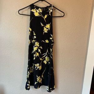 No sleeve A-line sundress. Black w yellow flowers
